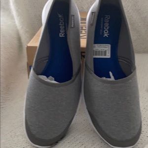 Brand New never worn Reebok gray slip on